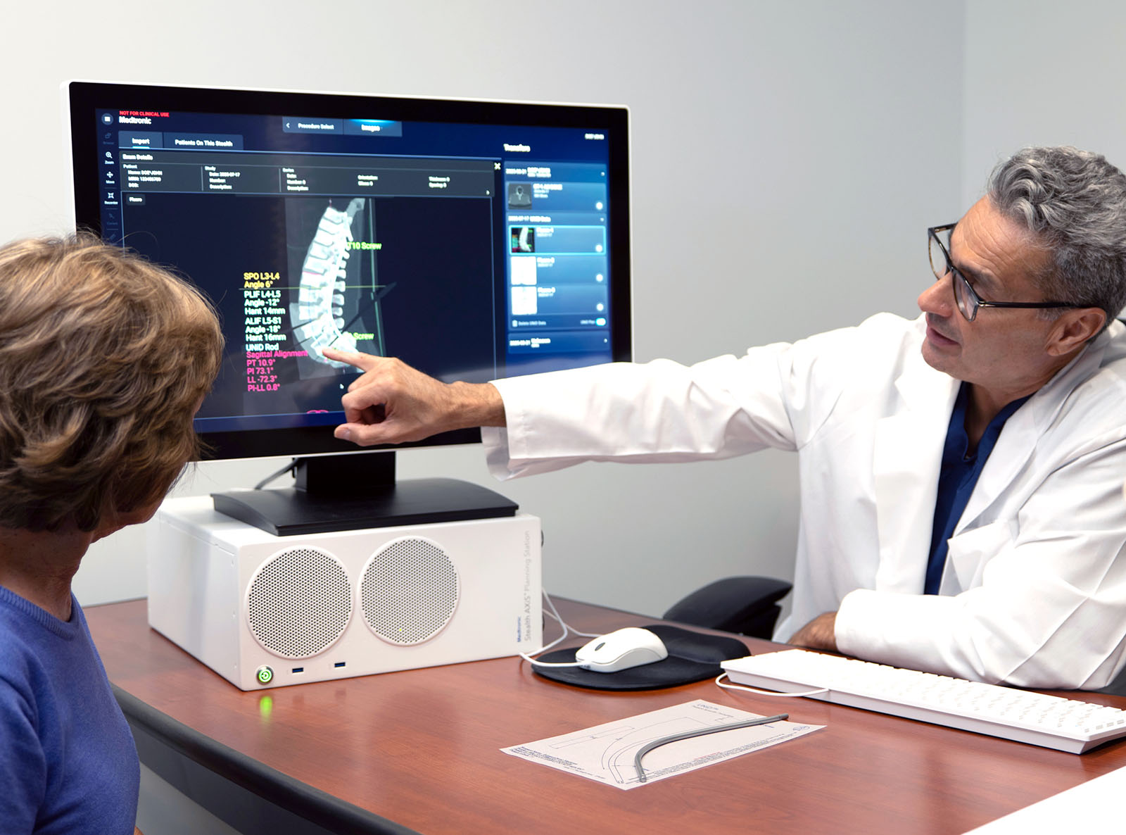 Doctor With Patient and Stealth Axis Interface